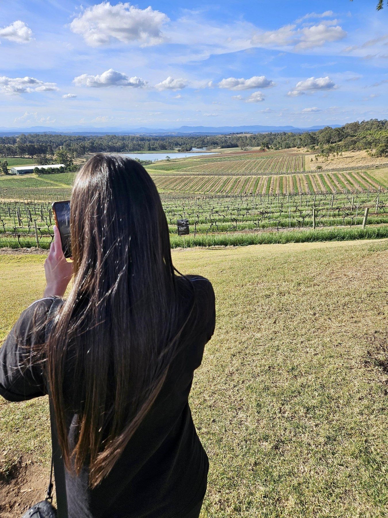 Belle creating destination content overlooking a vineyard